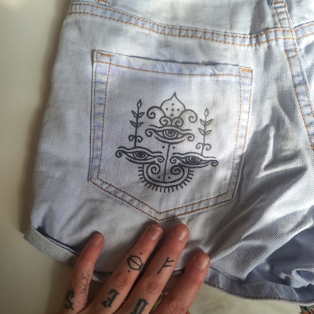 Size 29 Forever 21 Jean shorts with inked design